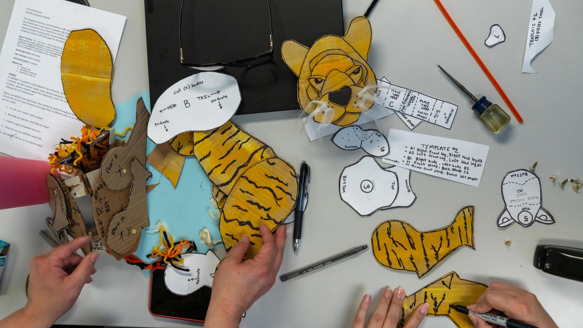 Children creating an animated cutout of a tiger. 