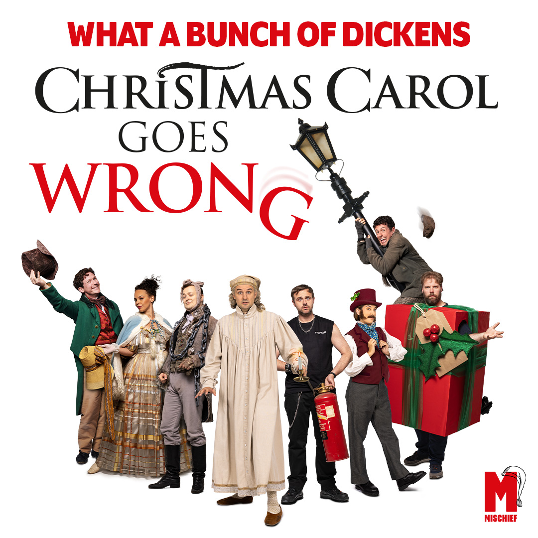 What a Bunch of Dickens. Christmas Carol Goes Wrong. Promotional artwork featuring the ensemble cast in Victorian costumes with comedic props, including a falling streetlamp and oversized gift box.