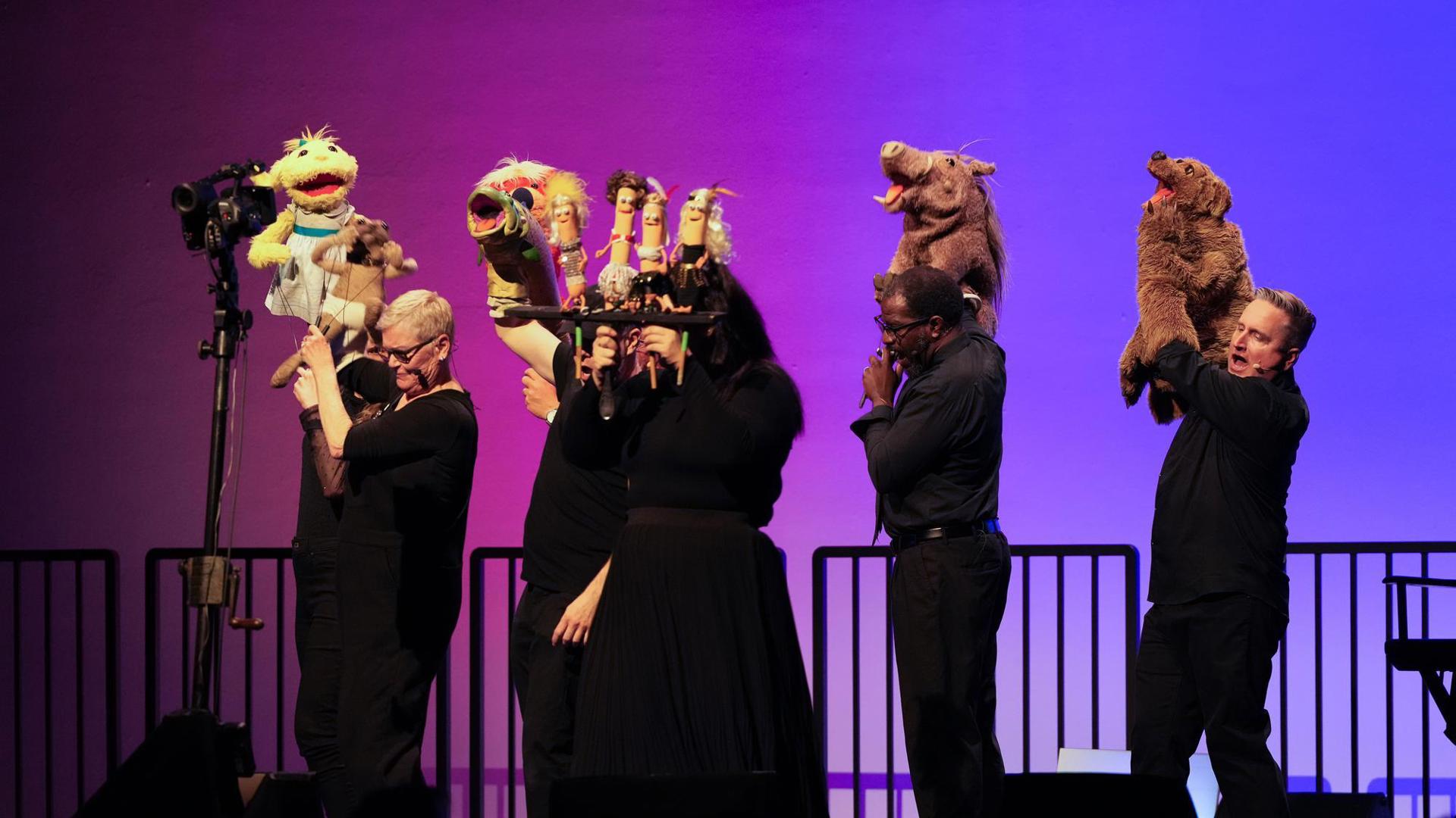 puppeteers preforming in puppet up